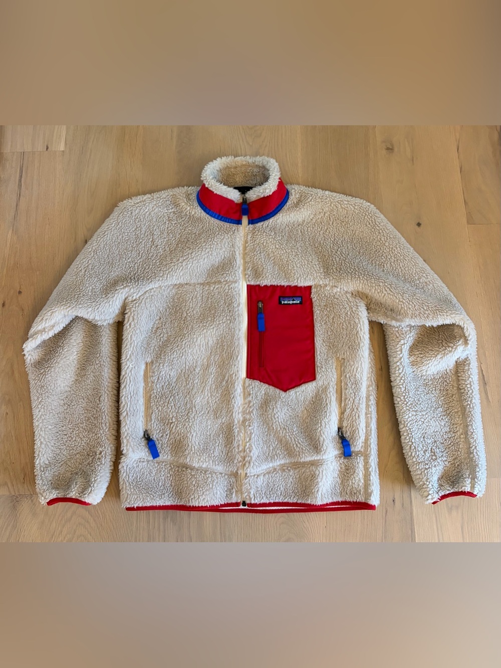 Patagonia Cream Sherpa Jacket with Red Pocket and Blue Trim - unisex